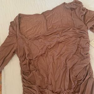 Free people top with flowy sleeves and fitted body